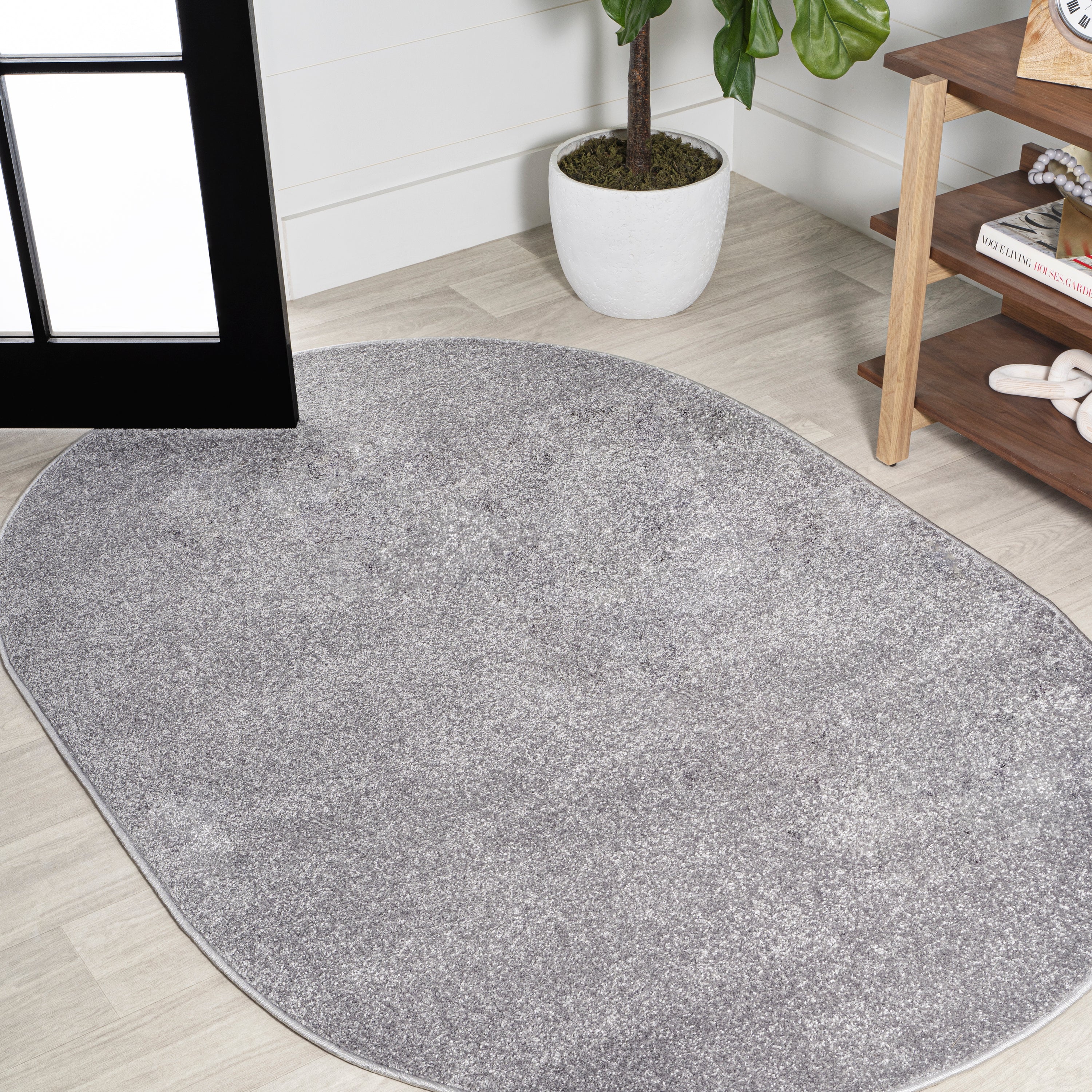 Haze Solid Sleek Low-Pile Oval Area Rug