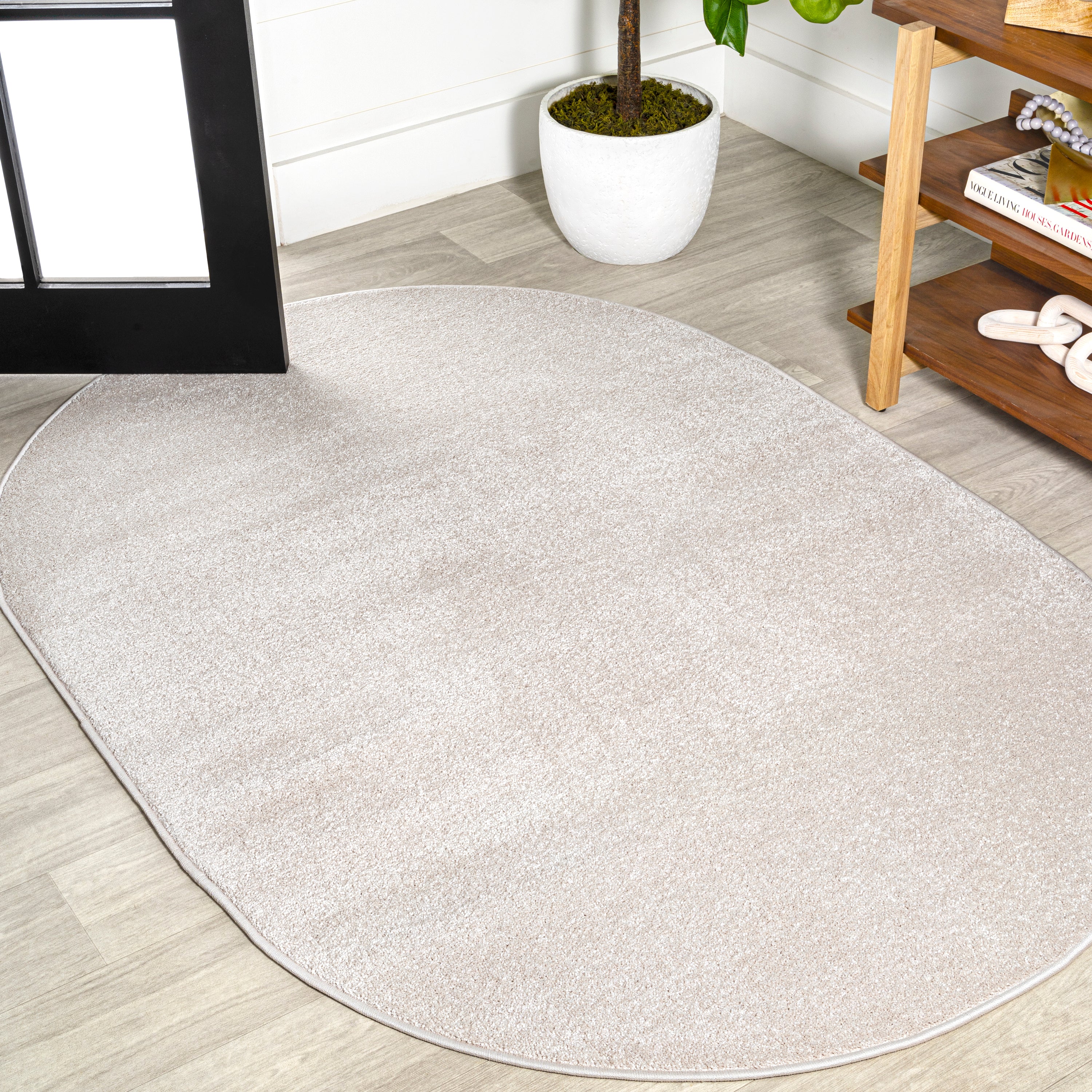 Haze Solid Sleek Low-Pile Oval Area Rug