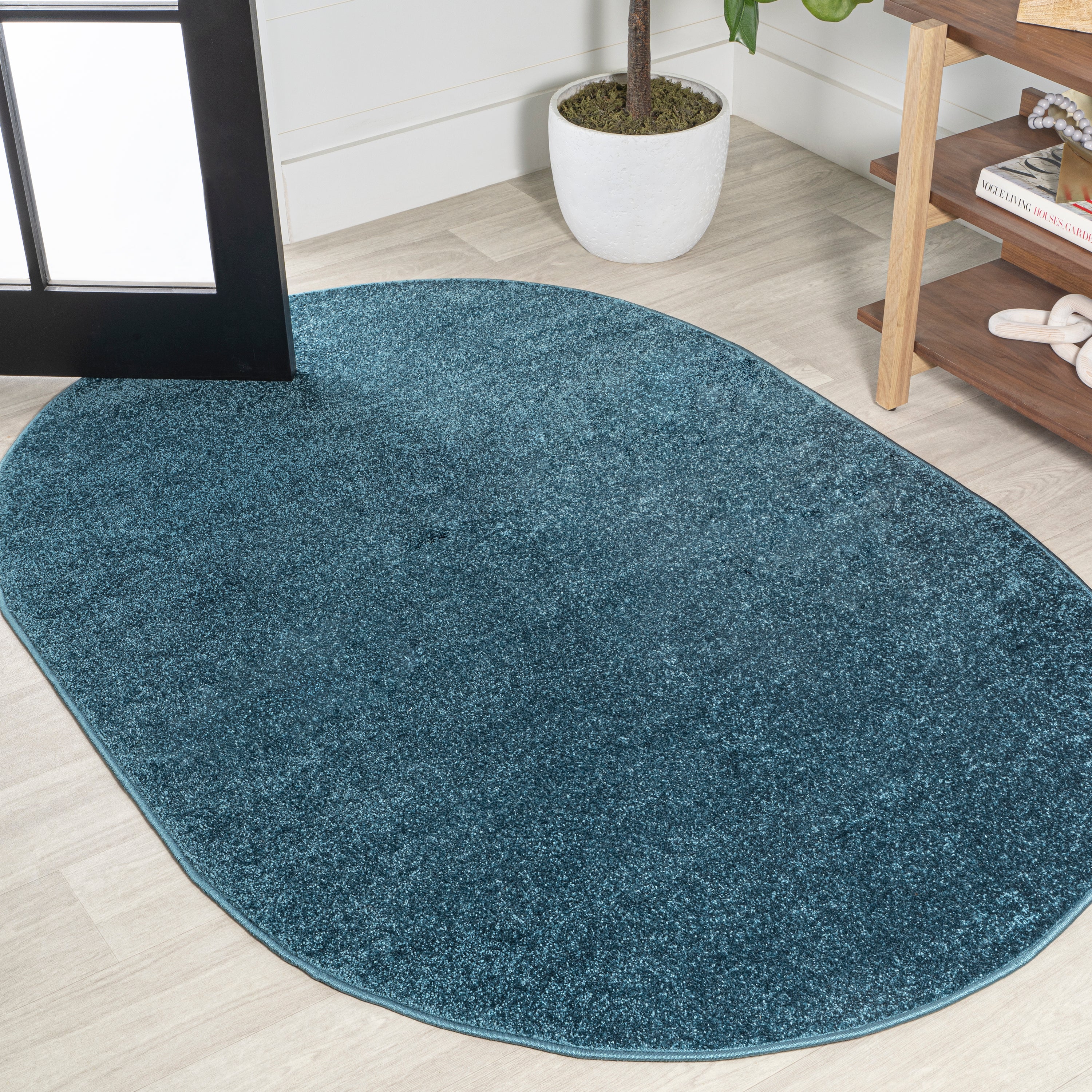 Haze Solid Sleek Low-Pile Oval Area Rug