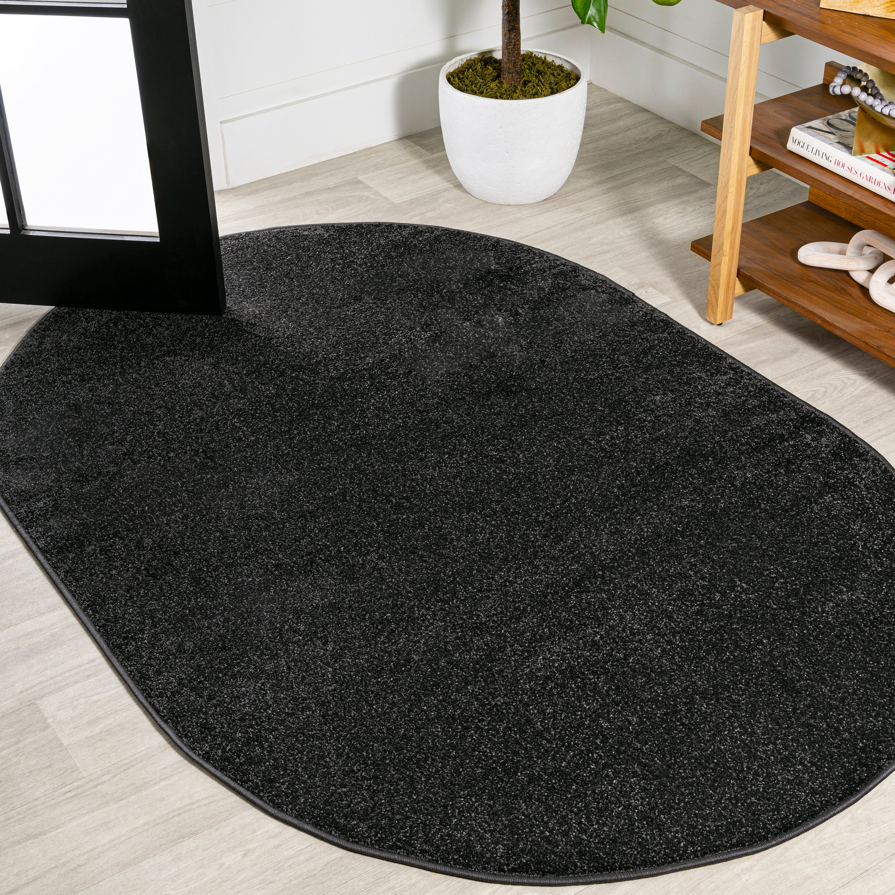 Haze Solid Sleek Low-Pile Oval Area Rug