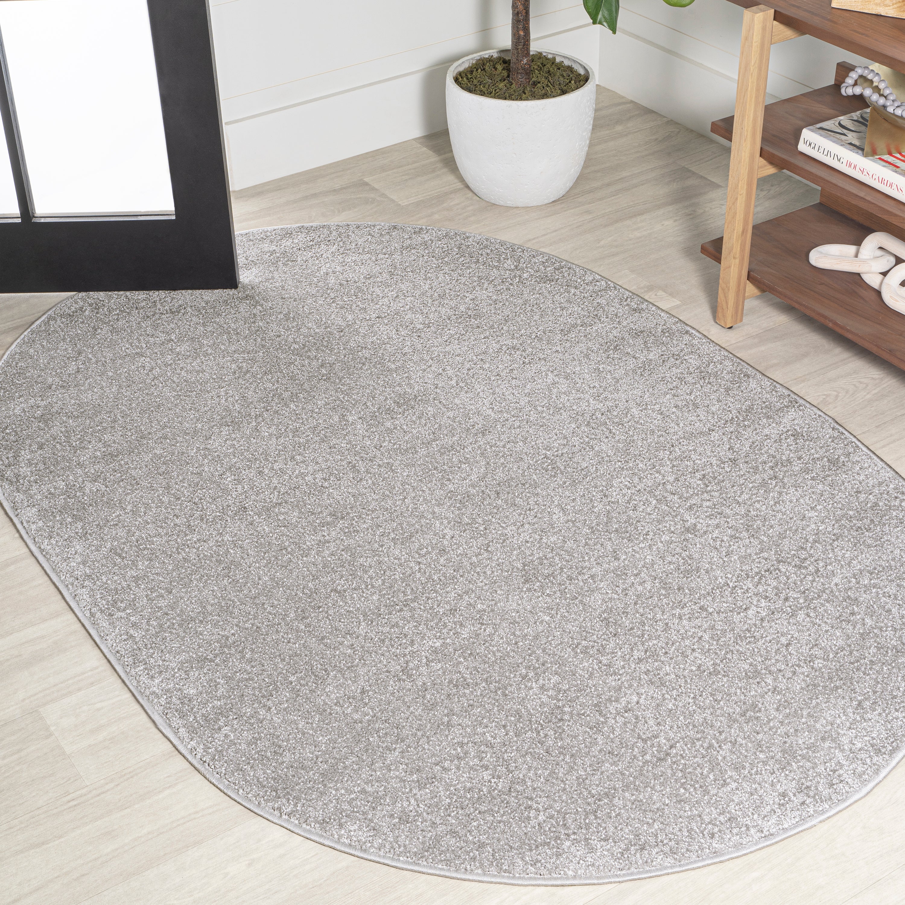 Haze Solid Unique Low-Pile Oval Area Rug