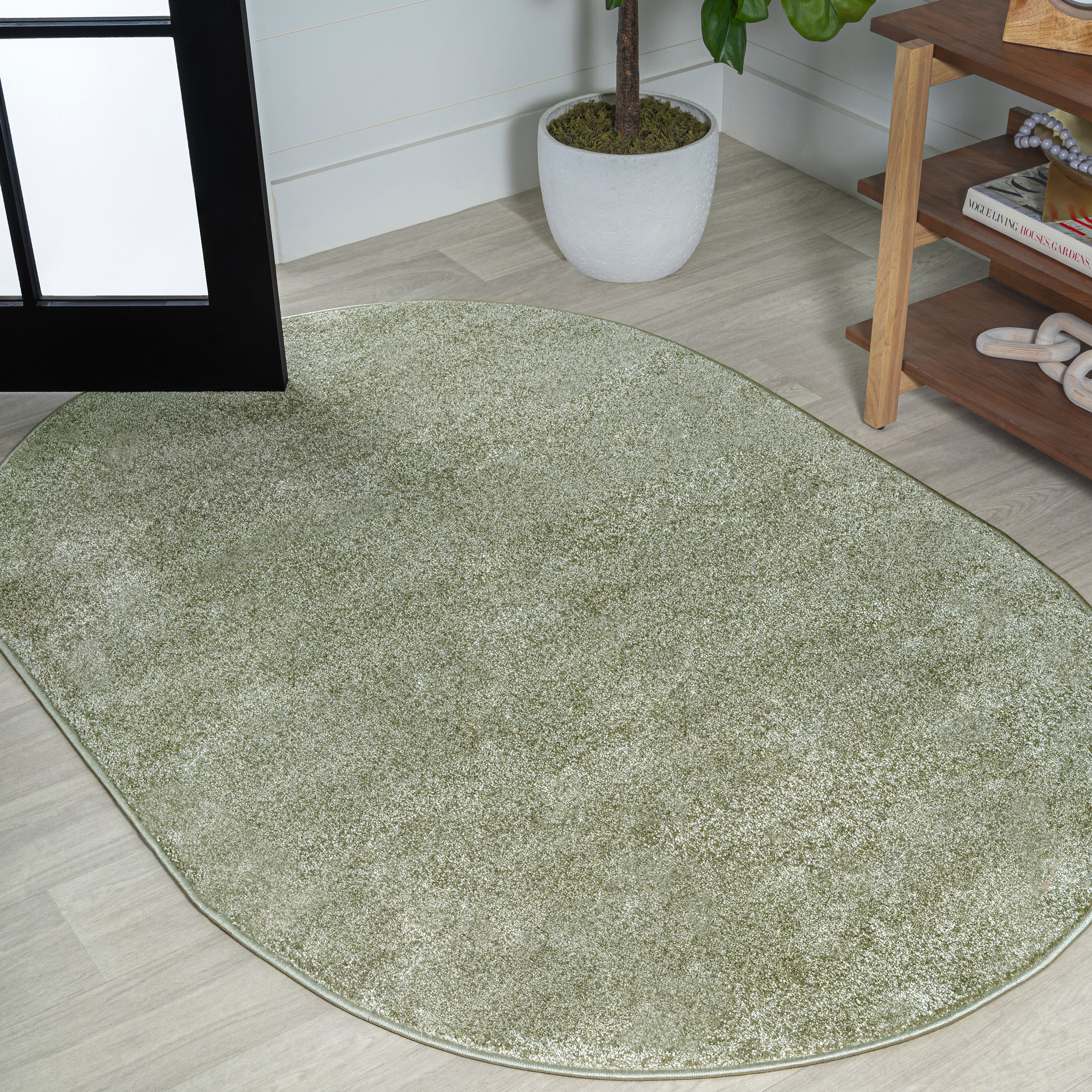 Haze Solid Unique Low-Pile Oval Area Rug