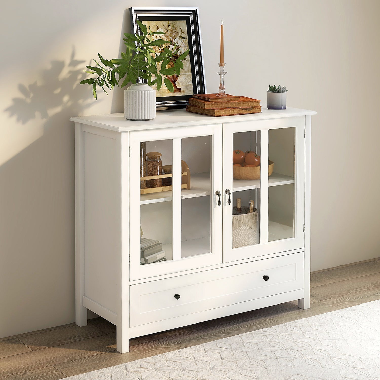 Buffet storage cabinet with double glass doors and unique bell handle - Tuesday Morning - Cabinets & Storage